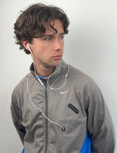 Nike 2000s IPod Nano Jacket (M)